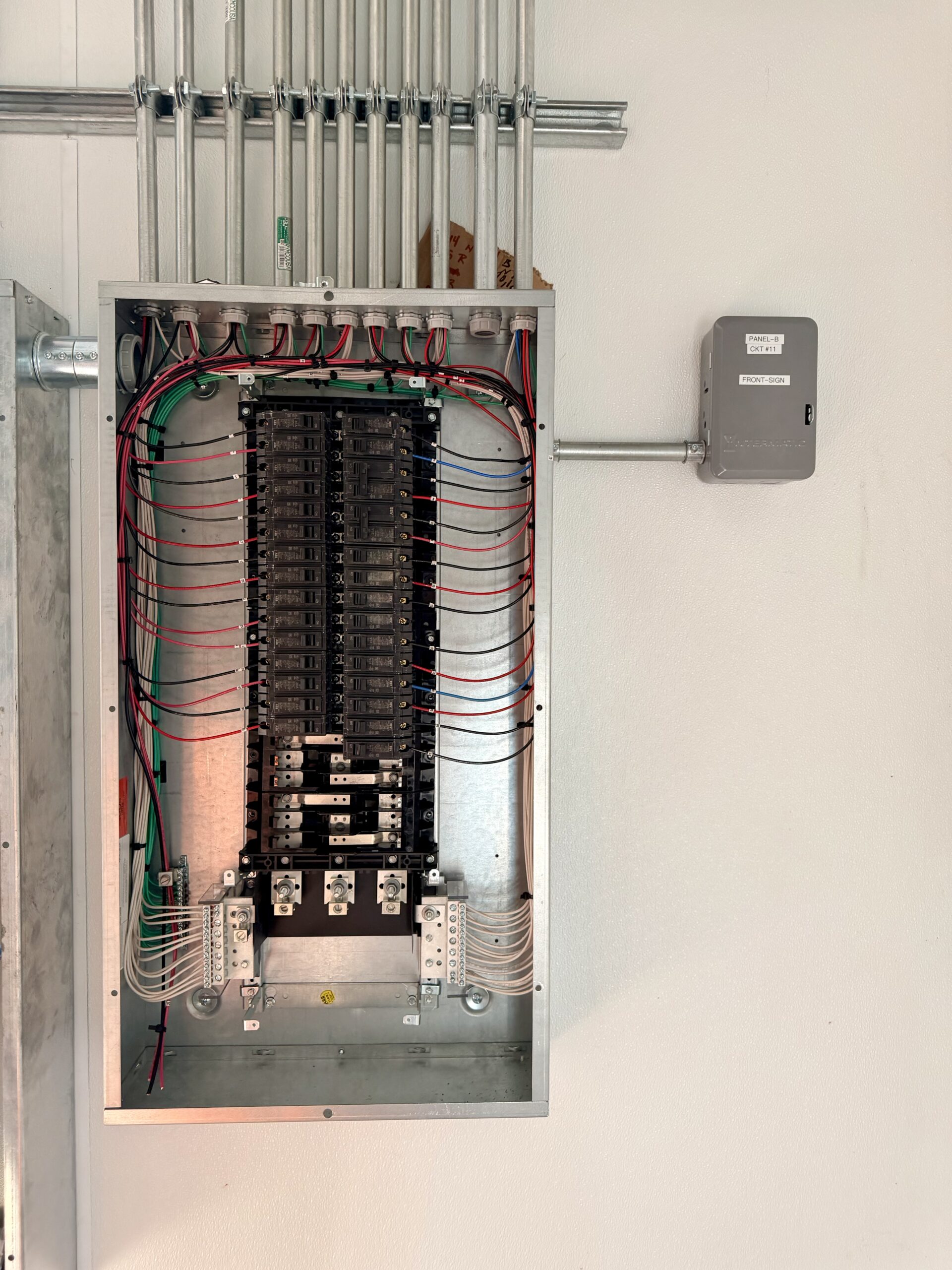 Panel and conduit installation